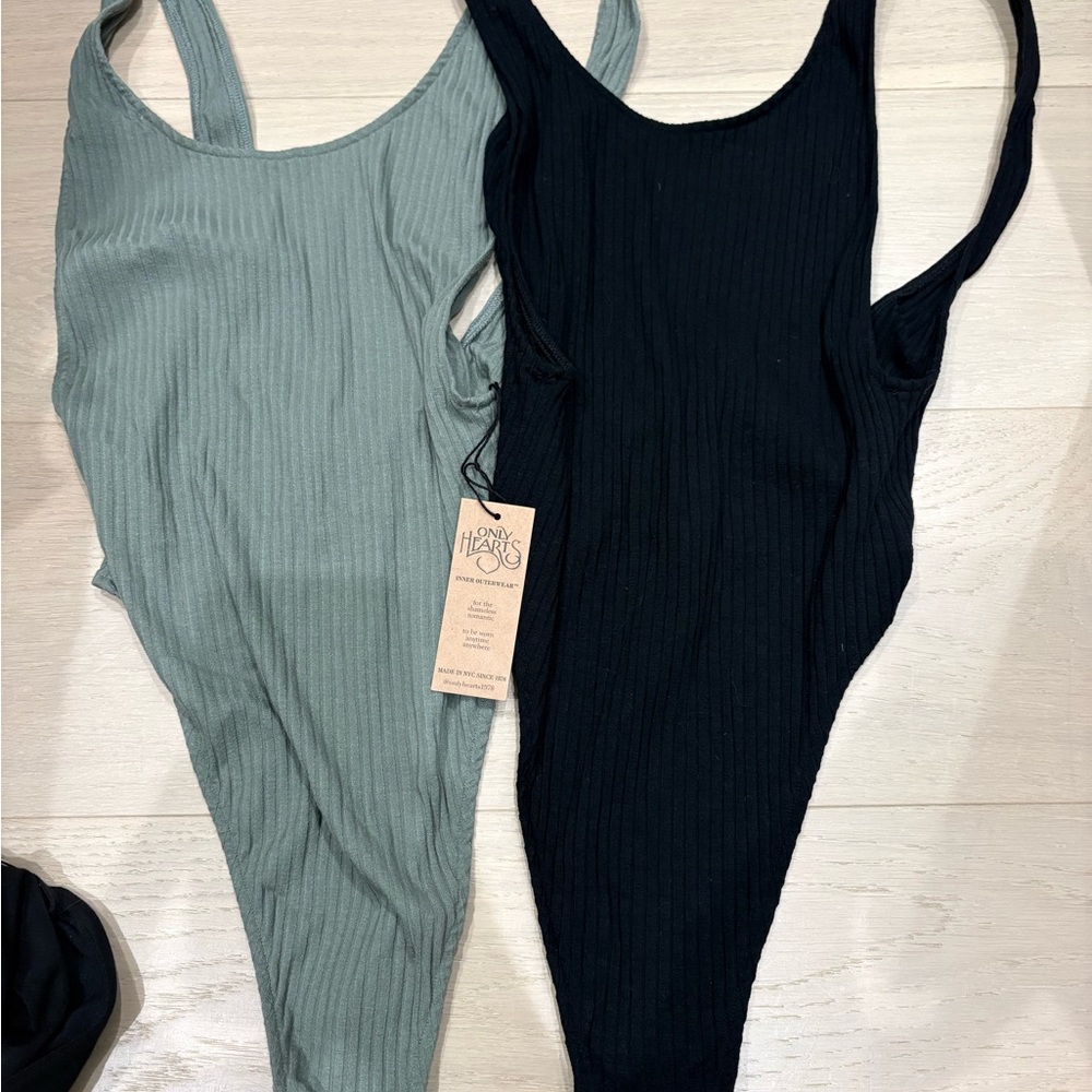 2 Women’s Only Hearts bodysuits green and black size small NWT